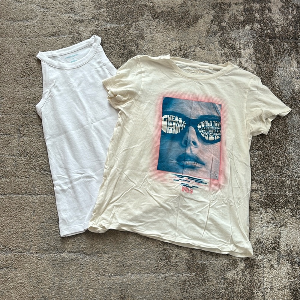 One new shirt and one used graphic shirt bundle! Both size Small
